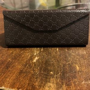 Gucci glasses case…